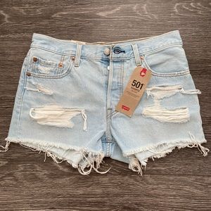 Levi mid rise distressed shorts